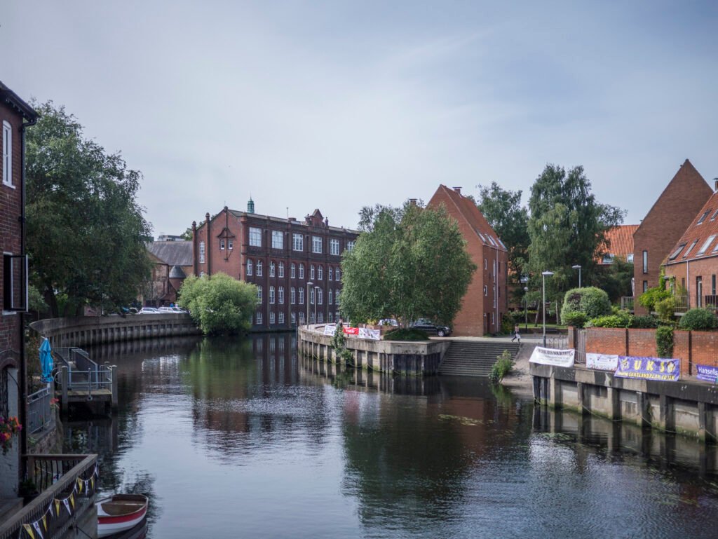 A photo of the river in Norwich and the houses that line it.