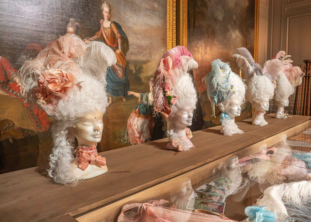 Wig film costumes at the Petit Trianon at the 20th Anniversary Marie Antoinette by Sofia Coppola exhibition at Versailles