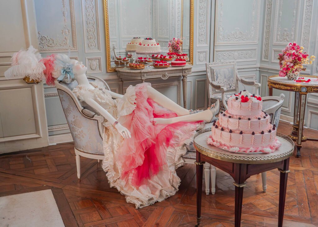 Let them eat cake tableau at the 20th Anniversary Marie Antoinette by Sofia Coppola exhibition at Versailles