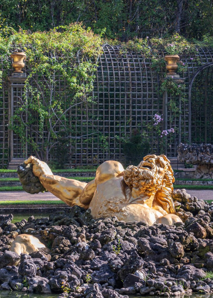 Statue in Enceladus Grove in the grounds of Versailles